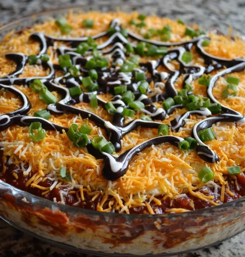 Spider Web Taco Dip Recipe Halloween Spider Web Taco Dip Easy Spider Web Taco Dip Best Cheese For Spider Web Taco Dip Spid...